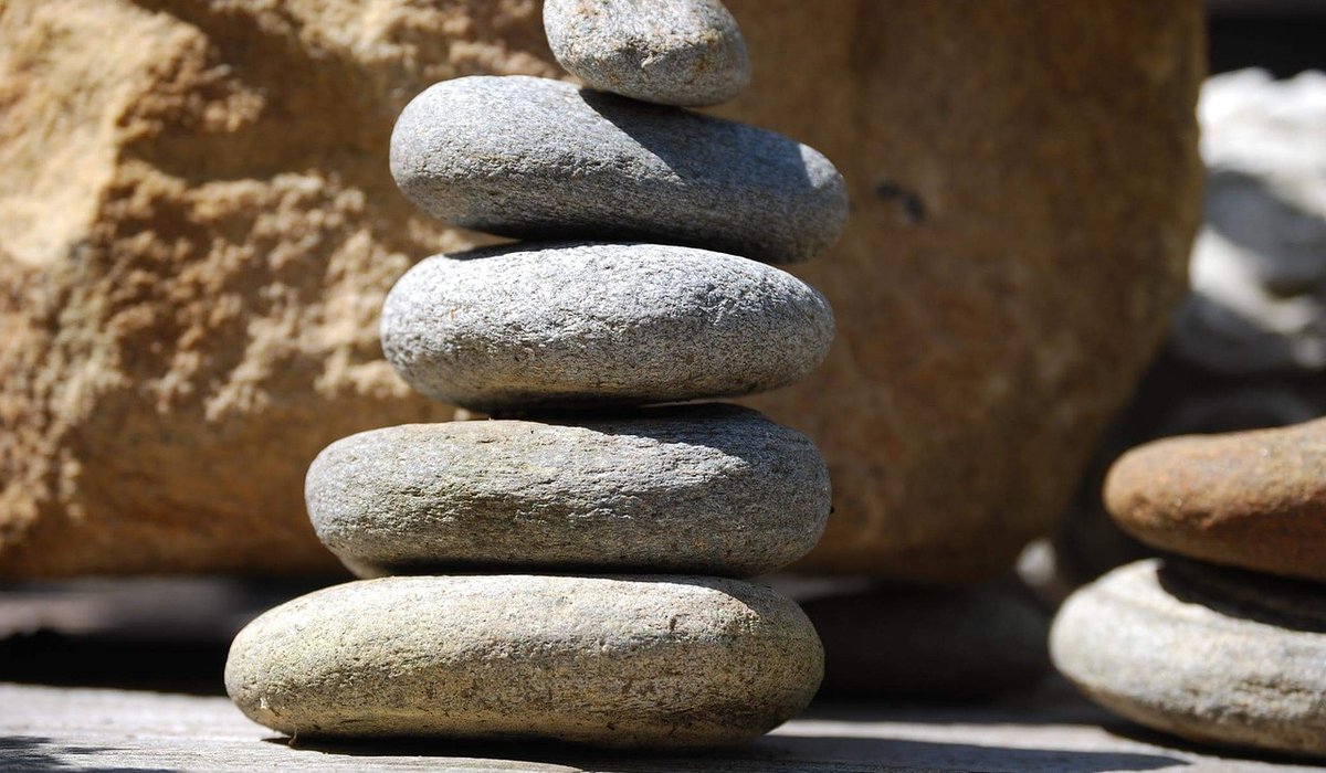 Reading a stone cairn on an upland path